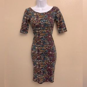 Rue21 tribal print bodycon dress with medium length sleeves and low back sz. S